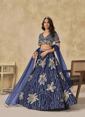 For A Designer Look,Grab These Party Wear Lehenga Choli in Fine Colored.These Lehenga And Blouse Are Fabricated On Art Silk Pair With Art Silk Dupatta.Its Beautified With Designer Sequance Embroidery Work.