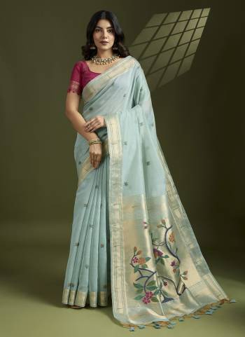 Garb These Festive Wear Saree in Fine Colored.These Saree And Blouse is Fabricated On Muga Cotton.Its Beautified With Multy Thread Weaving Paithani Designer.