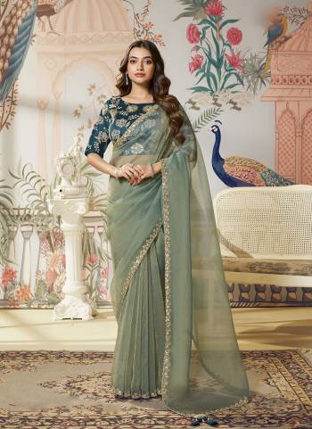 Look Attractive These Designer Party Wear Fancy Saree in Fine Colored.These Saree Are Jari Organza Silk And Blouse Raw Slub Silk is Fabricated.Its Beautified Fancy Dual Sequance Embroidery Work.