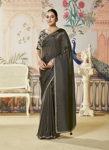 Look Attractive These Designer Party Wear Fancy Saree in Fine Colored.These Saree Are Jari Organza Silk And Blouse Two Tone Satin Silk is Fabricated.Its Beautified Fancy Dual Sequance Embroidery Work.