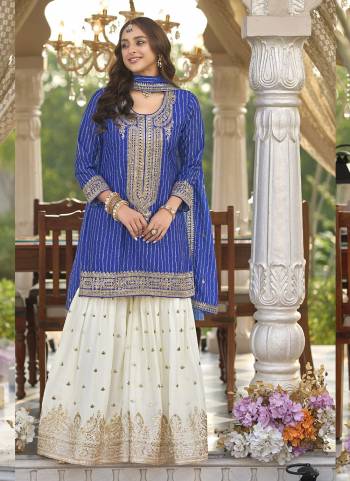 Looking These Party Wear Designer Plazzo Suits in Fine Colored Pair With Dupatta.These Top Are Chinon And Dupatta Are Fabricated On Chinon Pair With Chinon Bottom.Its Beautified With Heavy Designer Embroidery Work.