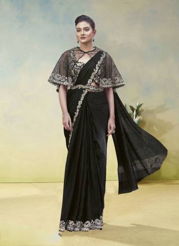 Look Attrective These Designer Party Wear Fancy Ready To Wear Saree With Blouse in Fine Colored.These Saree Are Two Tone Satin Silk And Blouse Malai is Fabricated.Its Beautified Solid,Desiger Dual Sequance Embroidery With Pearl Work.