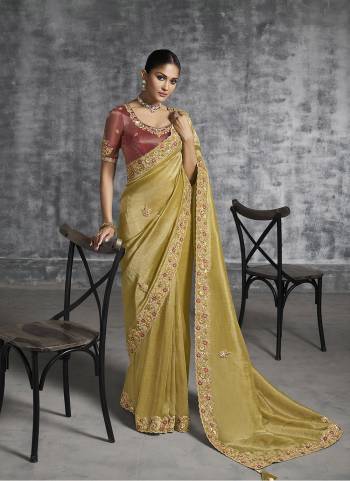 Looking These Fastival Wear Saree in Fine Colored.These Saree Are Tissue Silk And Blouse is Fabricated On Silk.Its Beautified With Designer Mirror,Jari,Sequance Embroidery With Pearl Stone Work.