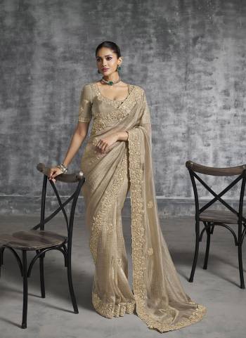 Looking These Fastival Wear Saree in Fine Colored.These Saree Are Tissue Silk And Blouse is Fabricated On Silk.Its Beautified With Designer Mirror,Jari,Sequance Embroidery With Pearl Stone Work.