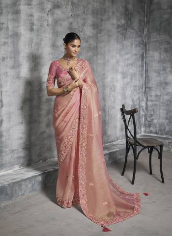 Looking These Fastival Wear Saree in Fine Colored.These Saree Are Tissue Silk And Blouse is Fabricated On Silk.Its Beautified With Designer Mirror,Jari,Sequance Embroidery With Pearl Stone Work.