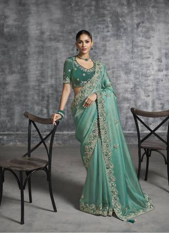 Looking These Fastival Wear Saree in Fine Colored.These Saree Are Tissue Silk And Blouse is Fabricated On Silk.Its Beautified With Designer Mirror,Jari,Sequance Embroidery With Pearl Stone Work.