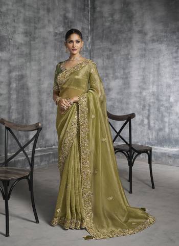 Looking These Fastival Wear Saree in Fine Colored.These Saree Are Tissue Silk And Blouse is Fabricated On Silk.Its Beautified With Designer Mirror,Jari,Sequance Embroidery With Pearl Stone Work.
