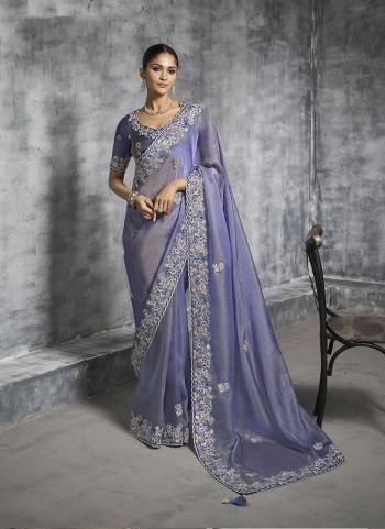 Looking These Fastival Wear Saree in Fine Colored.These Saree Are Tissue Silk And Blouse is Fabricated On Silk.Its Beautified With Designer Mirror,Jari,Sequance Embroidery With Pearl Stone Work.