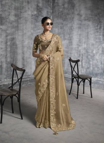 Looking These Fastival Wear Saree in Fine Colored.These Saree Are Tissue Silk And Blouse is Fabricated On Silk.Its Beautified With Designer Mirror,Jari,Sequance Embroidery With Pearl Stone Work.