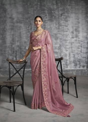 Looking These Fastival Wear Saree in Fine Colored.These Saree Are Tissue Silk And Blouse is Fabricated On Silk.Its Beautified With Designer Mirror,Jari,Sequance Embroidery With Pearl Stone Work.