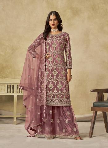 Looking These Beautiful Party Wear Fine Color Plazzo Suits.These Top Are Net And Dupatta Are Net And Bottom Net Fabricated.Its Beautified With Designer Sequance Embroidery Work.