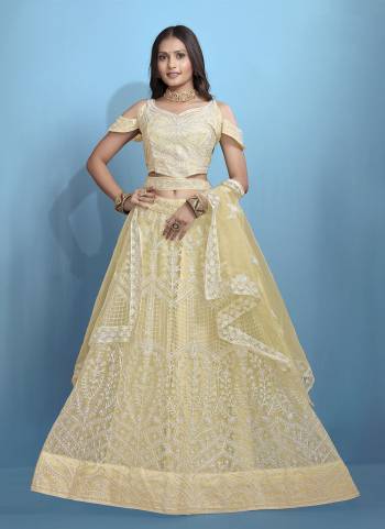 Grab These Beautiful Colored Lehenga Choli.These Lehenga and Dupatta Are Fabricated On Net Pair With Net Blouse.Its Beautified With Designer Thread Embroidery Work.