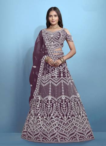 Grab These Beautiful Colored Lehenga Choli.These Lehenga and Dupatta Are Fabricated On Net Pair With Net Blouse.Its Beautified With Designer Thread Embroidery Work.