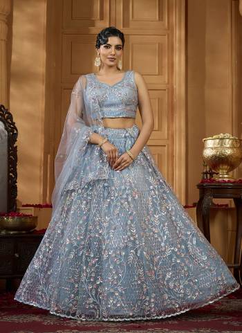 Garb This Party Wear Fine Color Fancy Heavy Designer Choli And Lahenga Fabriced On Net And Dupatta Net In Fabricated Beautified With Attrective Designer Heavy Sequance,Multy Thread  Embroidery Work. Buy Now.