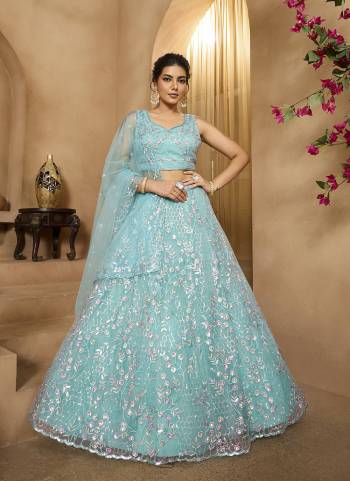 Garb This Party Wear Fine Color Fancy Heavy Designer Choli And Lahenga Fabriced On Net And Dupatta Net In Fabricated Beautified With Attrective Designer Heavy Sequance,Multy Thread  Embroidery Work. Buy Now.