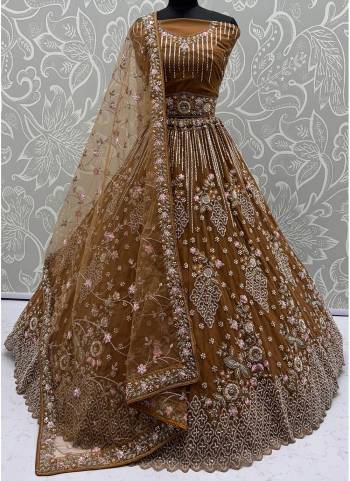 For A Fancy Designer Look,Grab These Lehenga Choli With Dupatta in Fine Colored.These Lehenga And Choli Are Net And Dupatta Are Fabricated On Soft Net Pair.Its Beautified With Heavy Flower Multy Cotton Thread,Silver Dori, Sequance Embroidery,Zarkon Diamond With Crystal Pipi Hand Work. 