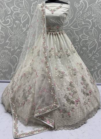 For A Fancy Designer Look,Grab These Lehenga Choli With Dupatta in Fine Colored.These Lehenga And Choli Are Net And Dupatta Are Fabricated On Soft Net Pair.Its Beautified With Heavy Flower Multy Cotton Thread,Silver Dori, Sequance Embroidery,Zarkon Diamond With Crystal Pipi Hand Work. 