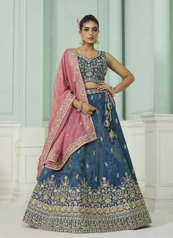 Looking This Party Wear Fine Color Fancy Heavy Designer Choli And Lahenga Fabriced On Cosmos Silk And Dupatta Cosmos Silk In Fabricated Beautified With Attrective Designer Heavy Sequance,Multy Thread  Embroidery Work. Buy Now.