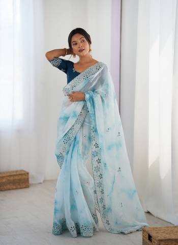 Garb These Party Wear Saree in Fine Colored.These Saree Are Fendy And Blouse is Malai Silk Fabricated.Its Beautified With Badal Printed Designer With Sequance,Coding Embroidery Work.