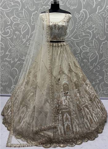 For A Fancy Designer Look,Grab These Lehenga Choli With Dupatta in Fine Colored.These Lehenga And Choli Are Net And Dupatta Are Fabricated On Soft Net Pair.Its Beautified With Heavy Dori, Sequance Embroidery,Modif Pipe Work. 