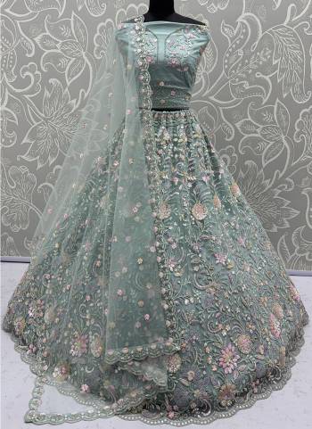 For A Fancy Designer Look,Grab These Lehenga Choli With Dupatta in Fine Colored.These Lehenga And Choli Are Net And Dupatta Are Fabricated On Soft Net Pair.Its Beautified With Heavy Multy Thread,Dori,Sequance Embroidery,Zarkon Diamond Work. 