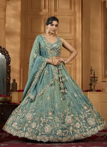 Atrractive This Party Wear Fine Color Fancy Heavy Designer Choli And Lahenga Fabriced On Tissue And Dupatta Tissue In Fabricated Beautified With Attrective Designer Heavy Sequance,Multy Thread  Embroidery Work. Buy Now.