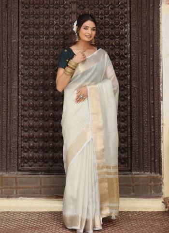 Garb These Fastive And Party Wear Saree in Fine Colored.These Saree And Blouse is Fabricated On Cotton.Its Beautified With Weaving Jari Pallu Border Designer.