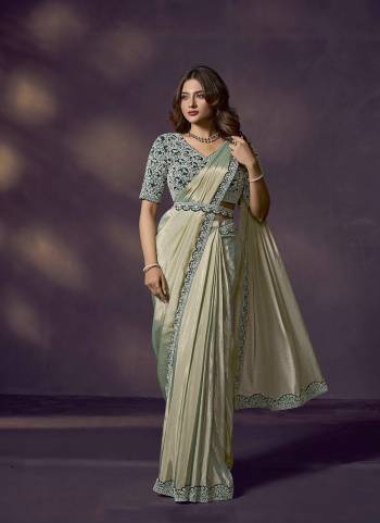 Look Attrective These Designer Party Wear Ready To Wear Saree With Blouse in Fine Colored.These Saree Are Two Tone Satin Silk And Blouse Satin Silk is Fabricated.Its Beautified Solid,Heavy Fancy Desiger Embroidery With Hand Work .