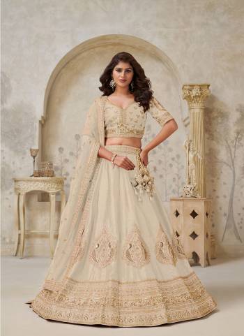 For A Designer Look,Grab These Lehenga Choli in Fine Colored.These Lehenga And Choli Are Fabricated On Silk Pair With Soft Net Dupatta.Its Beautified With Designer Embroidery,Hand Work.
