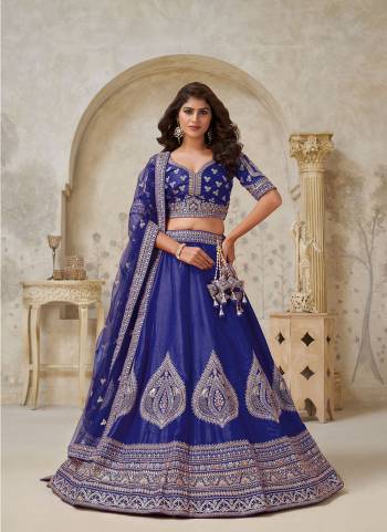 For A Designer Look,Grab These Lehenga Choli in Fine Colored.These Lehenga And Choli Are Fabricated On Silk Pair With Soft Net Dupatta.Its Beautified With Designer Embroidery,Hand Work.