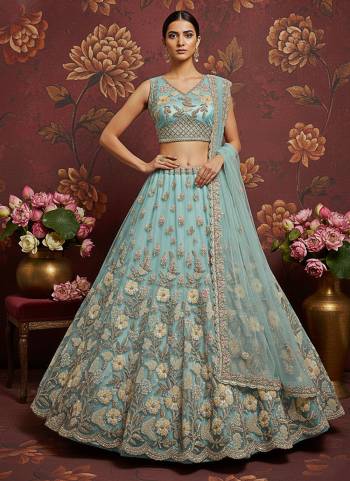 For A Fancy Designer Look,Grab These Lehenga Choli With Dupatta in Fine Colored.These Lehenga And Choli Are Net And Dupatta Are Fabricated On Soft Net Pair.Its Beautified With Heavy Sober Color Sequance,Jari,Dori Embroidery,Modif Crystal Pipe Hand Work. 