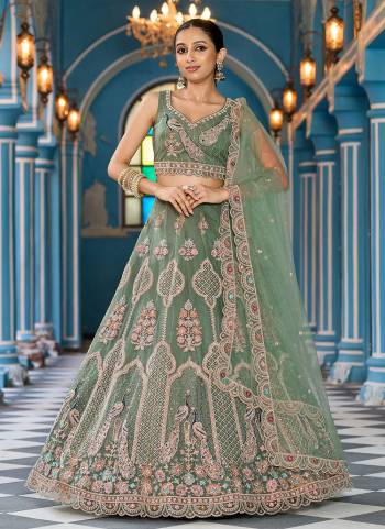Attrective Looking This Party Wear Fine Color Fancy Heavy Designer Choli And Lahenga Fabriced On Net And Dupatta Net In Fabricated Beautified With Attrective Designer Heavy Sequance, Thread Embroidery Work. Buy Now.
