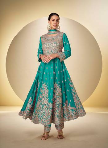 Attrective Looking These Designer Suit in Fine Colored Pair With Bottom And Dupatta.These Top And Bottom Are Fabricated On Chinon Pair With Chinon Dupatta.Its Beautified With Designer Heavy Embroidery Work.