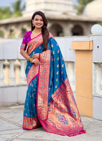 Garb These Party Wear Saree in Fine Colored.These Saree Are Paithani Silk And Blouse is Fabricated On Paithani Silk.Its Beautified With Weaving Jacquard Meenakari Designer.