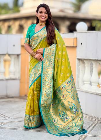 Garb These Party Wear Saree in Fine Colored.These Saree Are Paithani Silk And Blouse is Fabricated On Paithani Silk.Its Beautified With Weaving Jacquard Meenakari Designer.