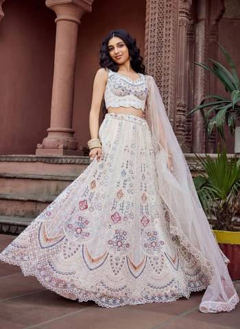 Attrective Looking This Party Wear Fine Color Fancy Heavy Designer Choli And Lahenga Fabriced On Net And Dupatta Net In Fabricated Beautified With Attrective Designer Heavy Sequance,Thread Embroidery Work. Buy Now.