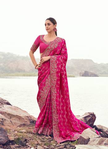 Attrective This Party wear Saree Paired With Blouse.This Saree Are Satin Jacquard Silk And Blouse Are Satin Silk Based Fabric With Weaving Jari Designer With Sequance,Jari,Thread Embroidery,Beads,Stone,Tassels Work. Buy This Pretty Saree Now.