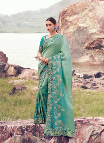 Attrective This Party wear Saree Paired With Blouse.This Saree Are Bhagalpuri Tissue Jacquard Silk And Blouse Are Tissue Silk Based Fabric With Weaving Jari Designer With Sequance,Jari,Thread Embroidery,Beads,Stone,Tassels Work. Buy This Pretty Saree Now.