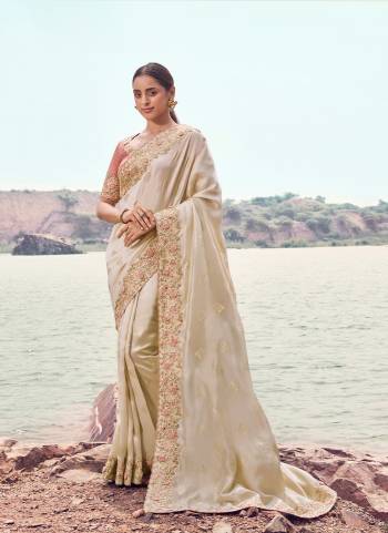 Attrective This Party wear Saree Paired With Blouse.This Saree Are Satin Silk And Blouse Are Tissue Silk Based Fabric With Designer Sequance,Jari,Thread Embroidery,Beads,Stone,Tassels Work. Buy This Pretty Saree Now.