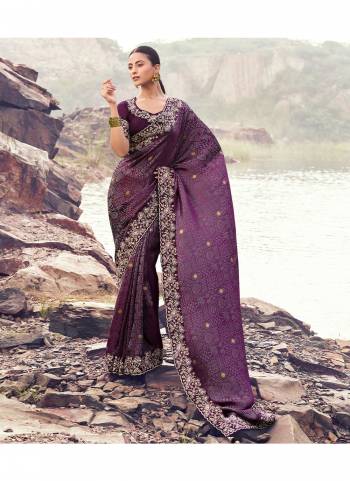 Attrective This Party wear Saree Paired With Blouse.This Saree Are Satin Jacquard Silk And Blouse Are Tissue Silk Based Fabric With Weaving Jari Designer With Sequance,Jari,Thread Embroidery,Beads,Stone,Tassels Work. Buy This Pretty Saree Now.