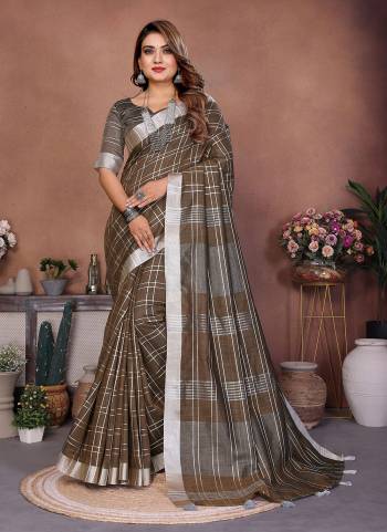 Garb These Party Wear Saree in Fine Colored.These Saree And Blouse is Fabricated On Linen Cotton.Its Beautified With Woven Checks Designer.