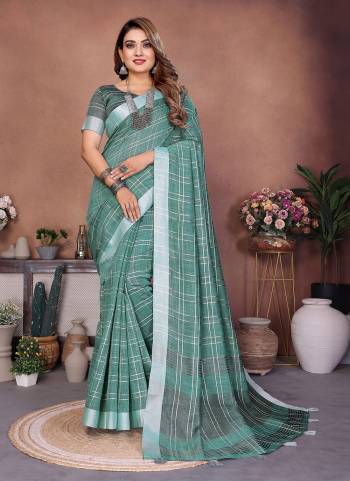 Garb These Party Wear Saree in Fine Colored.These Saree And Blouse is Fabricated On Linen Cotton.Its Beautified With Woven Checks Designer.