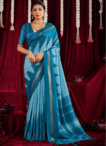 Garb These Traditinol Party Wear Saree in Fine Colored.These Saree Are Ikkat Silk And Blouse is Fabricated On Ikkat Silk Pair.Its Beautified With Designer Zig Zag Printed.