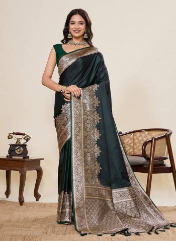 Garb This Party Wear Saree Paired With Blouse.This Saree And Blouse Are Satin Silk Fabric With Woven Jari Border Galla Designer. Buy This Pretty Saree Now.