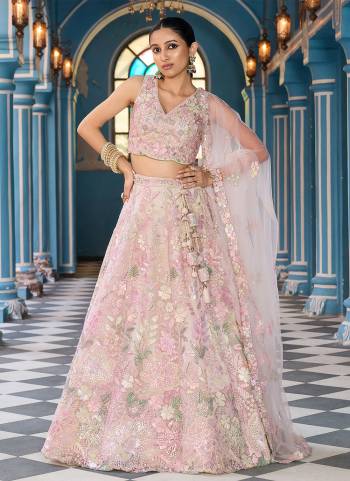 Attrective Looking This Party Wear Fine Color Fancy Heavy Designer Choli And Lahenga Fabriced On Net And Dupatta Net In Fabricated Beautified With Attrective Designer Sequance Embroidery Work. Buy Now.