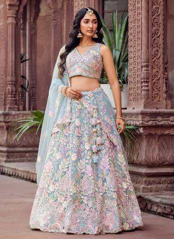 Attrective Looking This Party Wear Fine Color Fancy Heavy Designer Choli And Lahenga Fabriced On Net And Dupatta Net In Fabricated Beautified With Attrective Designer Sequance Embroidery Work. Buy Now.