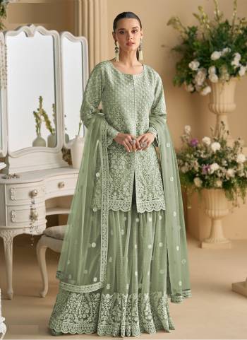 Attractive These Party Wear Free Size Stitched Plazzo Suit in Fine Colored Pair With Dupatta.These Top And Dupatta Are Net And Bottom Are Crepe Silk And Pair With Santoon Inner.Its Beautified With Heavy Designer Embroidery Work.