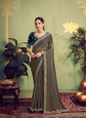 Look Attractive These Designer Party Wear Fancy Saree in Fine Colored.These Saree Are Jari Organza Satin And Blouse Two Tone Silk is Fabricated.Its Beautified Fancy Designer Embroidery, Hand Work.