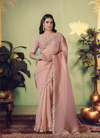 Look Attractive These Designer Party Wear Fancy Saree in Fine Colored.These Saree Are Glass Tissue And Blouse Satin Silk is Fabricated.Its Beautified Fancy Designer Embroidery, Hand Work.