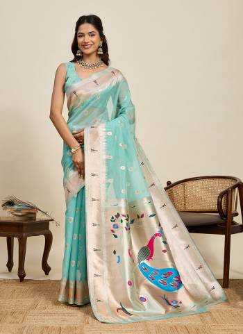 Garb This Party Wear Saree Paired With Blouse.This Saree And Blouse Are Cotton Silk Fabric With Woven Paithani Meenakari Designer. Buy This Pretty Saree Now.